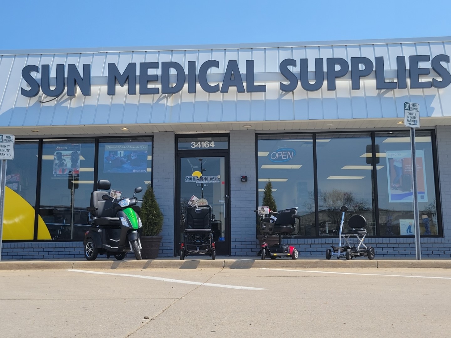 Sun Medical Supplies mobility scooters outside of store