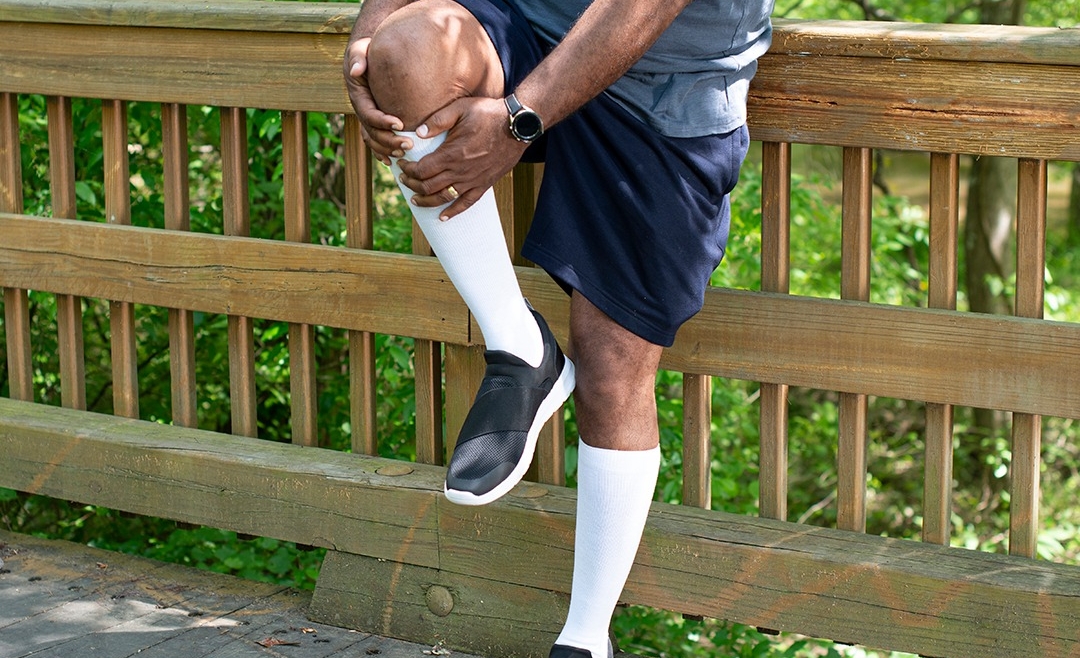 Man wearing Sigvaris compression stockings